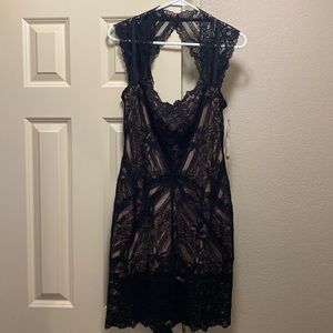 Nicole Miller black lace with blush liner. Size: Medium